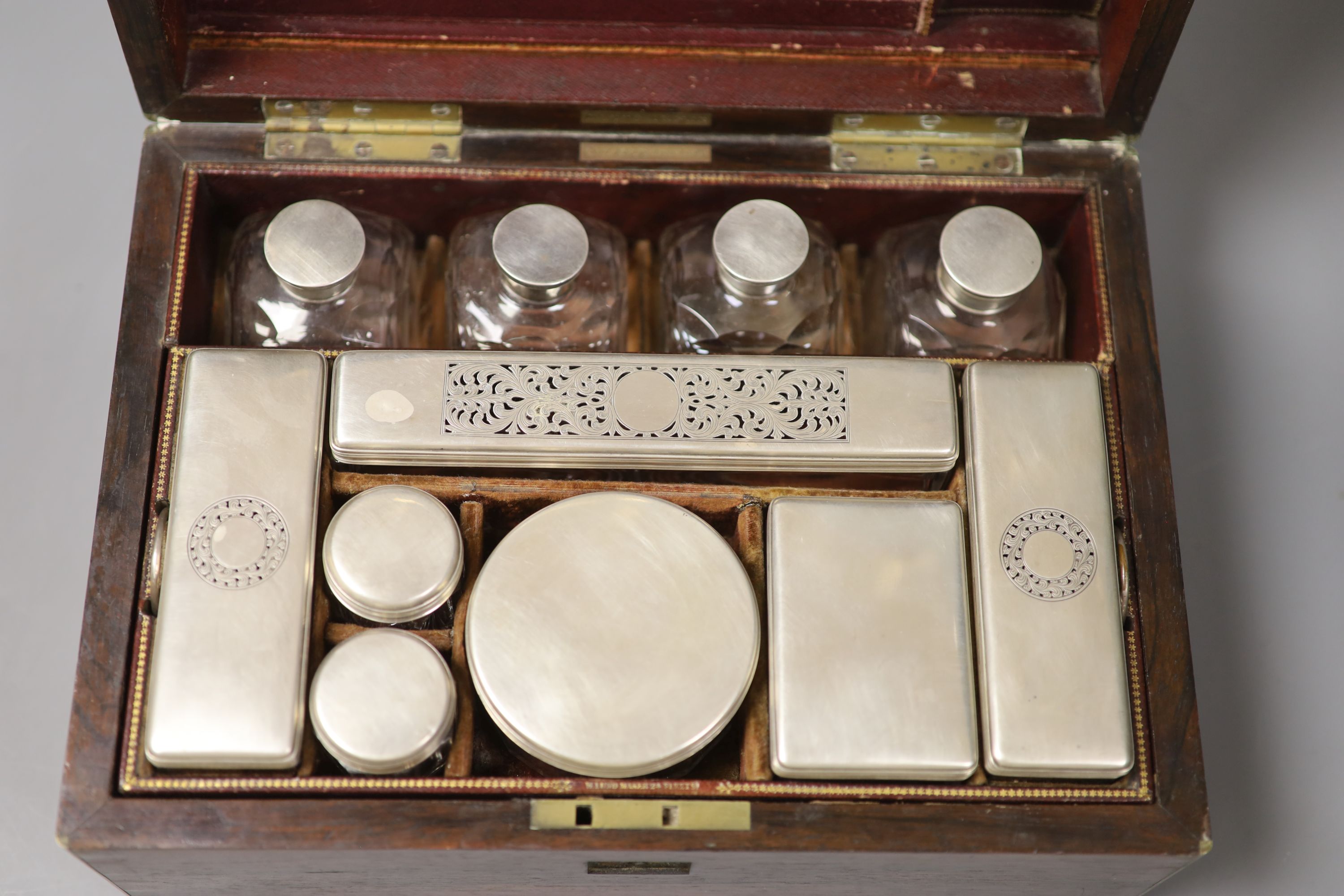 An early Victorian W.Lund brass bound rosewood toilet box with silver mounted fittings W. 29.5cm D.21cm H.14.5cm